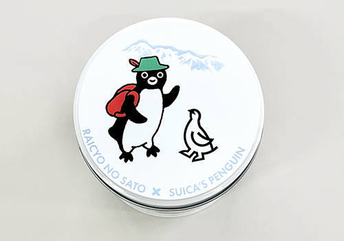 Suicaのペンギン×雷鳥の里ガーゼタオル缶の上部。Suicaのペンギンと雷鳥のマークが描かれている